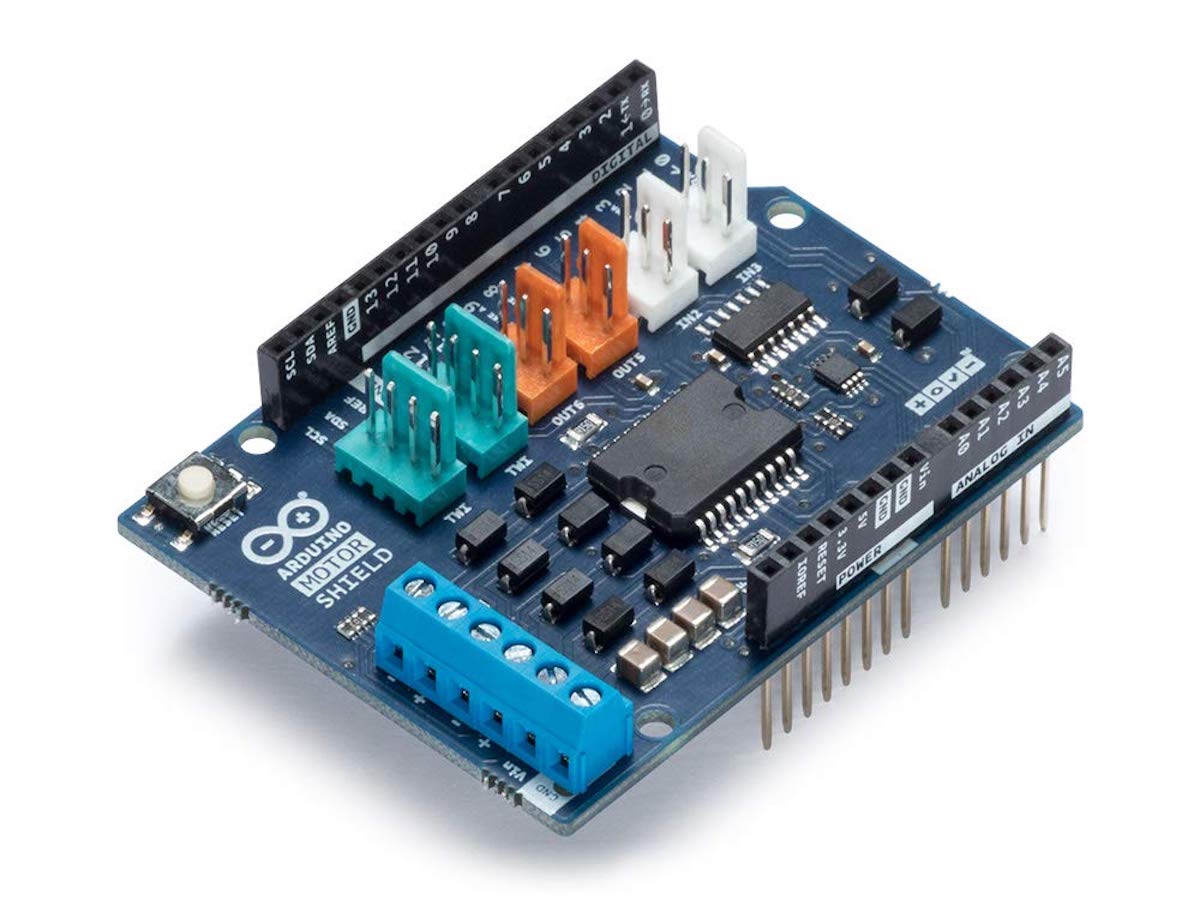 Arduino Motor Shield Rev3 in blue PCB with black headers, integrated circuit, and blue terminal blocks, for electrónica. - Arduino Motor Shield Rev3 - Microbot México - Default Title
