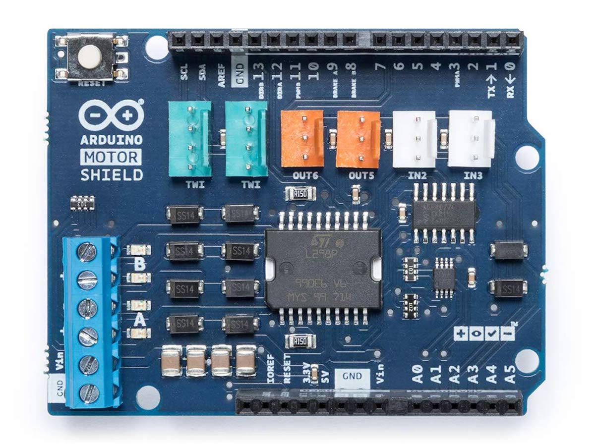 Arduino Motor Shield Rev3 with blue PCB, integrated circuit, screw terminals, and components for electrónica and. - Arduino Motor Shield Rev3 - Microbot México - Default Title