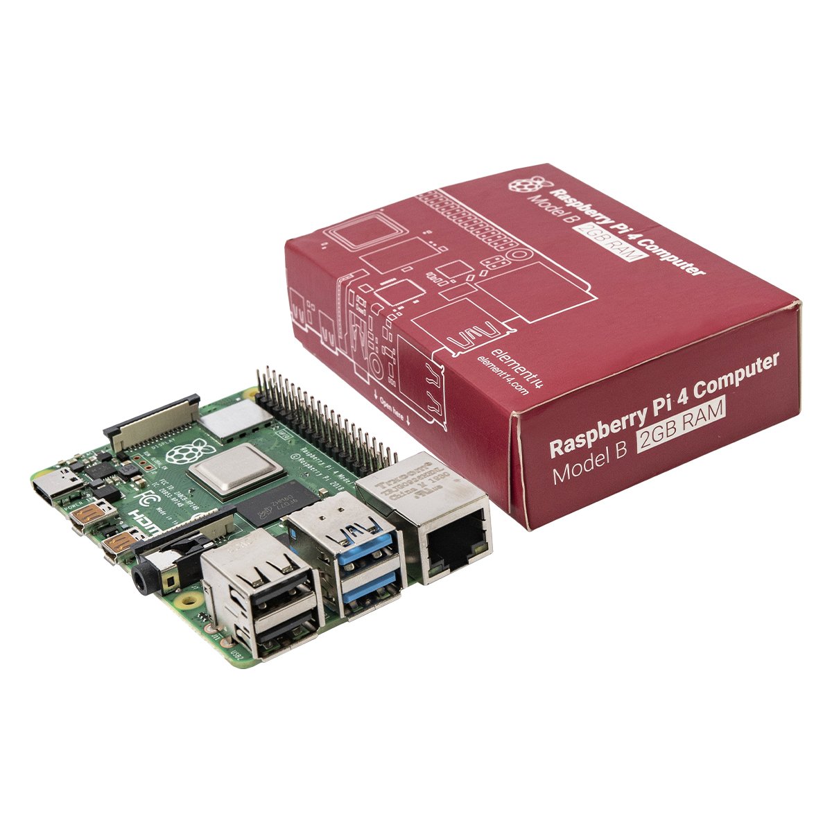 Raspberry Pi 4 Model B computer board with USB ports and GPIO pins beside red electronics kit box labeled Raspberry Pi 4. - Kit Raspberry Pi 4 Oficial - Microbot México - 1GB