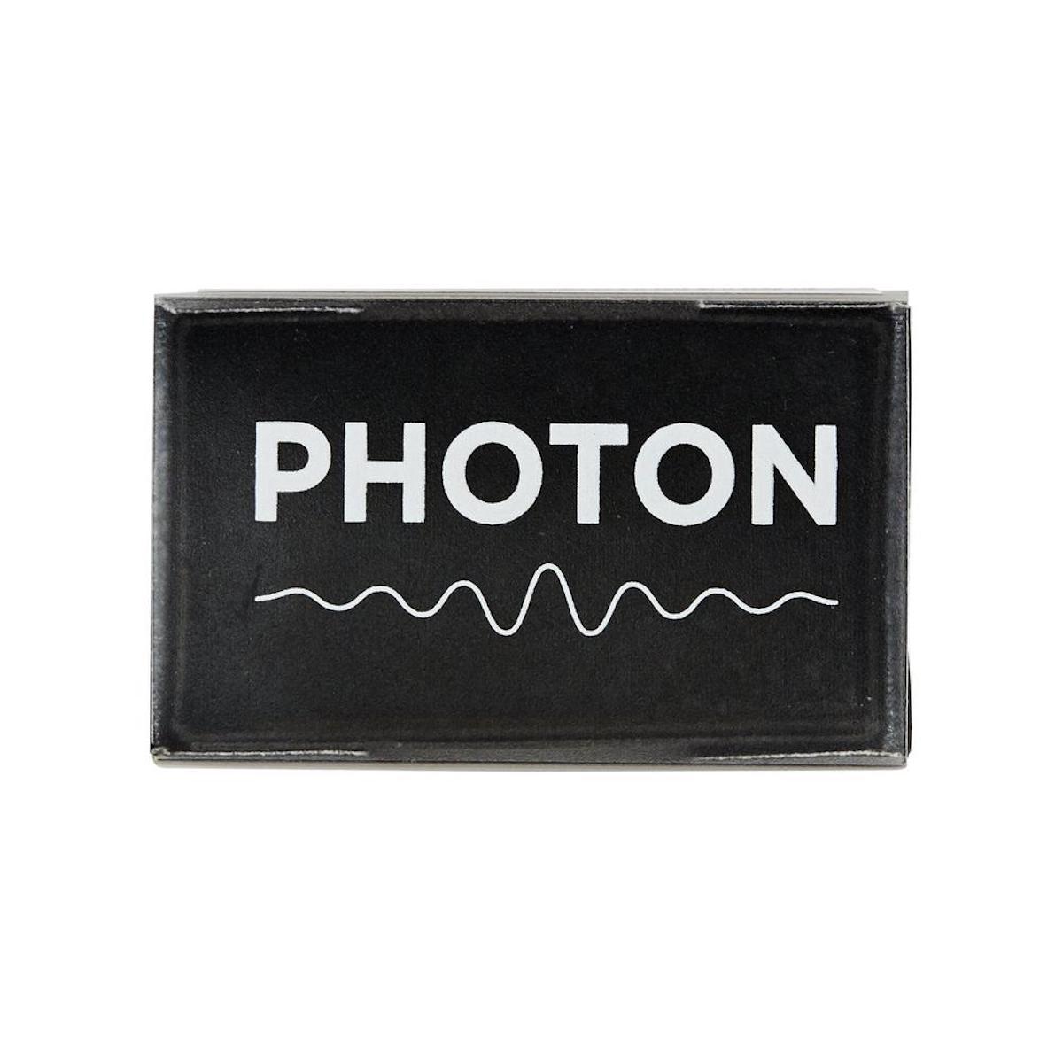 Black rectangular Particle Photon header with white "PHOTON" text, ideal for electrónica and microcontroladores projects. - Particle Photon Headers - Microbot México - Default Title